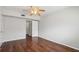 Bright bedroom showcasing sleek hardwood floors, neutral walls, and a ceiling fan at 91 Rumson Ne Rd # C32, Atlanta, GA 30305