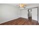 A light-filled bedroom features hardwood floors and a ceiling fan for added comfort at 91 Rumson Ne Rd # C32, Atlanta, GA 30305