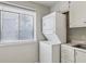 Bright, efficient kitchen space including a stackable washer dryer at 91 Rumson Ne Rd # C32, Atlanta, GA 30305