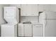 Clean kitchen including stackable washer and dryer, dishwasher, and refrigerator at 91 Rumson Ne Rd # C32, Atlanta, GA 30305