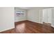 Open-concept living area with gleaming hardwood floors and natural lighting at 91 Rumson Ne Rd # C32, Atlanta, GA 30305