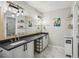 Modern bathroom features double vanity, large mirror, and stylish lighting at 1605 Beaumont Cir, Duluth, GA 30096