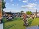 Outdoor venue with string lights, casual seating, and people enjoying a sunny day at 1605 Beaumont Cir, Duluth, GA 30096