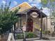 View of the restaurant exterior with stone facade, stairs, and visible signage at 1605 Beaumont Cir, Duluth, GA 30096