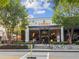 Inviting restaurant exterior with sidewalk seating and well-manicured landscaping, perfect for outdoor dining at 1605 Beaumont Cir, Duluth, GA 30096