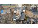 Aerial view showcasing a community of newly built townhomes with modern architecture and landscaping at 174 Sidney St, Marietta, GA 30060