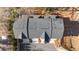 Aerial view of townhome rooftops, driveways and neighborhood landscaping showcasing a well-planned community at 174 Sidney St, Marietta, GA 30060