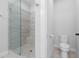 Clean bathroom featuring glass enclosed shower and toilet at 174 Sidney St, Marietta, GA 30060