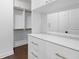 Walk-in closet featuring lots of storage and pull-out drawers at 174 Sidney St, Marietta, GA 30060