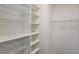Organized closet with adjustable shelving and wire baskets for efficient storage solutions at 174 Sidney St, Marietta, GA 30060