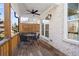 Cozy back deck featuring a ceiling fan and ample seating for outdoor gatherings at 174 Sidney St, Marietta, GA 30060