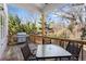Back deck with outdoor dining set and grill, perfect for entertaining guests outdoors at 174 Sidney St, Marietta, GA 30060