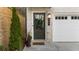 Close up of the front door showing the dark olive paint, craftsman style, and address number at 174 Sidney St, Marietta, GA 30060