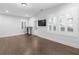 Bright living room with hardwood floors and lots of windows at 174 Sidney St, Marietta, GA 30060