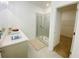 Modern bathroom featuring walk-in shower, vanity, and walk-in closet at 2785 Lifford Way, Duluth, GA 30097