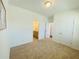 Neutral bedroom features carpet flooring and access to an ensuite bathroom at 2785 Lifford Way, Duluth, GA 30097