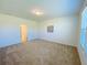 Spacious bedroom with neutral carpet and large window at 2785 Lifford Way, Duluth, GA 30097