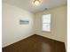 Cozy bedroom with hardwood flooring and a bright window at 2785 Lifford Way, Duluth, GA 30097