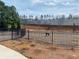 A fenced community dog park provides a safe and fun space for pets to play at 2785 Lifford Way, Duluth, GA 30097