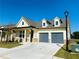 Inviting home featuring a two-car garage, tidy landscaping, and a welcoming facade at 2785 Lifford Way, Duluth, GA 30097