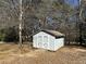 A well-maintained shed offers practical outdoor storage solutions and complements the home's landscaping at 3030 Scott Rd, Marietta, GA 30066