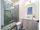 Modern bathroom featuring a glass shower, stylish vanity, and contemporary fixtures at 2179 Marann Ne Dr, Atlanta, GA 30345