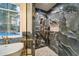 Stylish shower showcasing granite tiling, gold fixtures, and natural light at 2179 Marann Ne Dr, Atlanta, GA 30345