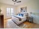 Cozy bedroom with a comfortable bed, stylish decor, and a large window for natural light at 2179 Marann Ne Dr, Atlanta, GA 30345