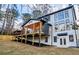 Exterior rear view of home with deck and large windows at 2179 Marann Ne Dr, Atlanta, GA 30345