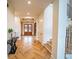 Elegant foyer featuring hardwood floors, stylish lighting, and a staircase for a grand entrance at 2179 Marann Ne Dr, Atlanta, GA 30345