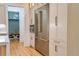 Kitchen featuring stainless steel refrigerator and microwave next to an entryway with bench and coat hooks at 2179 Marann Ne Dr, Atlanta, GA 30345