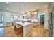 Bright, spacious kitchen with a large island, stainless steel appliances, and stylish pendant lighting at 2179 Marann Ne Dr, Atlanta, GA 30345