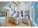 Stunning living room with natural light, fireplace, wood beams, and staircase at 2179 Marann Ne Dr, Atlanta, GA 30345