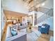 Bright open-concept living room with hardwood floors, high ceilings, and a staircase at 2179 Marann Ne Dr, Atlanta, GA 30345