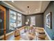 Stylish home office features large windows, modern lighting, and chic decor at 2179 Marann Ne Dr, Atlanta, GA 30345