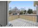 Spacious back deck with a beautiful view of the backyard and surrounding landscape at 3934 Conley Downs Ln, Decatur, GA 30034