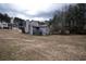 Spacious backyard with a well-maintained lawn, offering ample space for outdoor activities and relaxation at 3934 Conley Downs Ln, Decatur, GA 30034