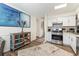 Modern kitchen featuring white cabinets, stainless steel appliances, and stylish decor at 3934 Conley Downs Ln, Decatur, GA 30034