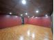 Finished basement featuring wood-look flooring, recessed lighting, and painted walls at 1072 Powell Wright Rd, Marietta, GA 30066