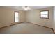Spacious bedroom with neutral walls and plush carpeting, offering comfort and style at 1072 Powell Wright Rd, Marietta, GA 30066