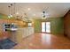 Open kitchen design with a large island, natural wood cabinetry, and stainless steel appliances at 1072 Powell Wright Rd, Marietta, GA 30066