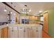 Bright kitchen features stainless steel appliances, ample counter space, and custom wood cabinets at 1072 Powell Wright Rd, Marietta, GA 30066