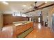 Expansive living room with hardwood flooring, a stone fireplace, and an open floor plan at 1072 Powell Wright Rd, Marietta, GA 30066