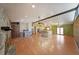 Open-concept living area showcasing a seamless flow to the kitchen with beamed ceilings at 1072 Powell Wright Rd, Marietta, GA 30066