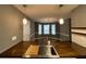 Bright kitchen featuring modern pendants, butcherblock counters, and stainless sink at 163 Woodwind Way, Jonesboro, GA 30238