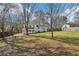 Enjoy this huge backyard with mature trees and ample space for outdoor activities at 55 Sunset Rd, Mcdonough, GA 30253