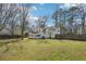 A wide-open backyard view, complete with full fencing for privacy at 55 Sunset Rd, Mcdonough, GA 30253