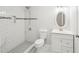 White and bright bathroom with updated shower and vanity at 55 Sunset Rd, Mcdonough, GA 30253
