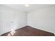 Bedroom with hardwood floors and fresh paint at 55 Sunset Rd, Mcdonough, GA 30253