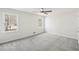 Bedroom with fresh neutral paint, carpet and ceiling fan at 55 Sunset Rd, Mcdonough, GA 30253